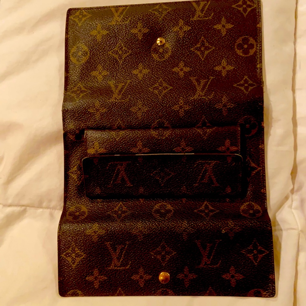 Louis Vuitton wallet, used.  Vintage Bought before serial nos.used.